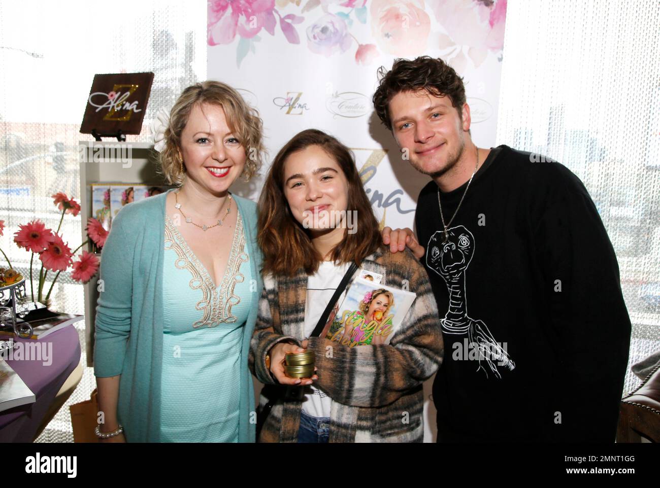 Chef Alina Z, from left, poses with Haley Lu Richardson and Brett Dier