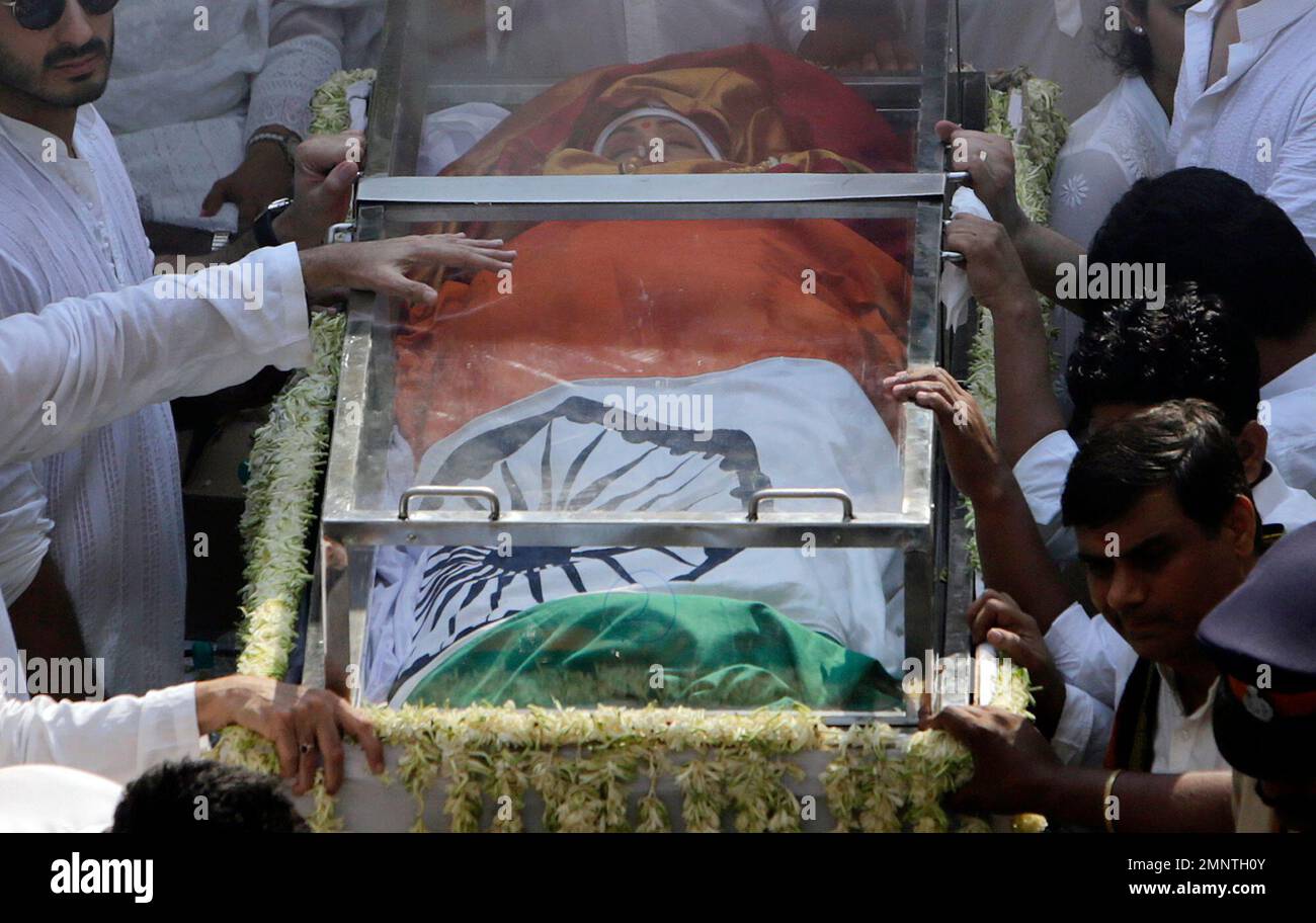 The body of Indian actress Sridevi covered with the Indian flag is