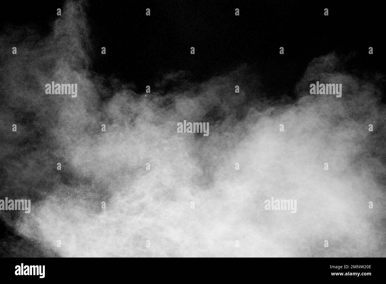 White dust cloud in the air.Abstract white powder explosion against