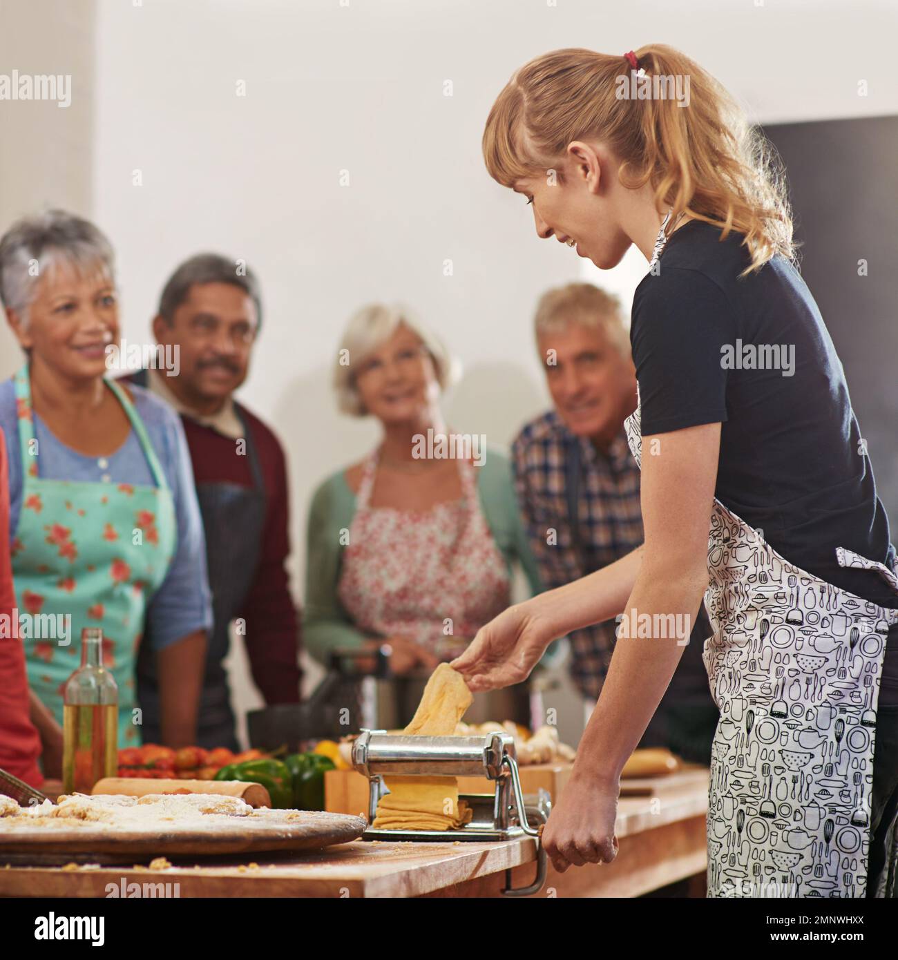 Showing Them How To Trim Their Grocery Bill A Woman Showing Her Class showing-them-how-to-trim-their-grocery-bill-a-woman-showing-her-class