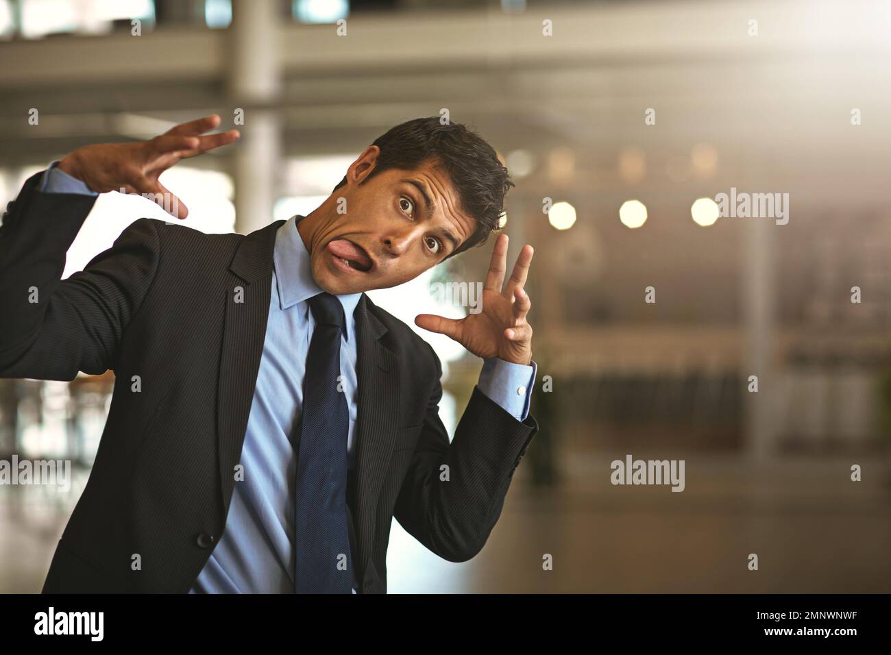 Business can get crazy. Cropped portrait of a businessman gesturing crazily in the office. Stock Photo