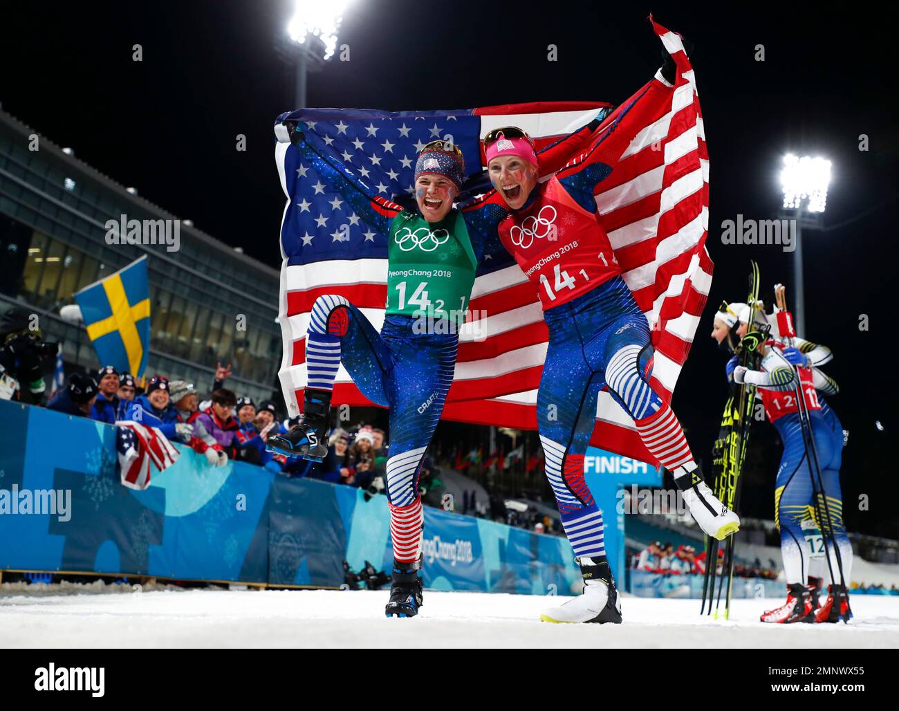 United States' Jessica Diggins, left, and Kikkan Randall celebrate