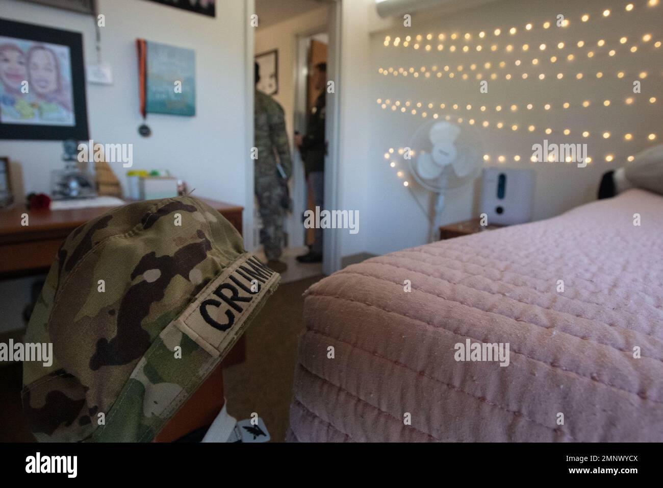 Fort Jackson senior enlisted leaders walk through the barracks room of ...