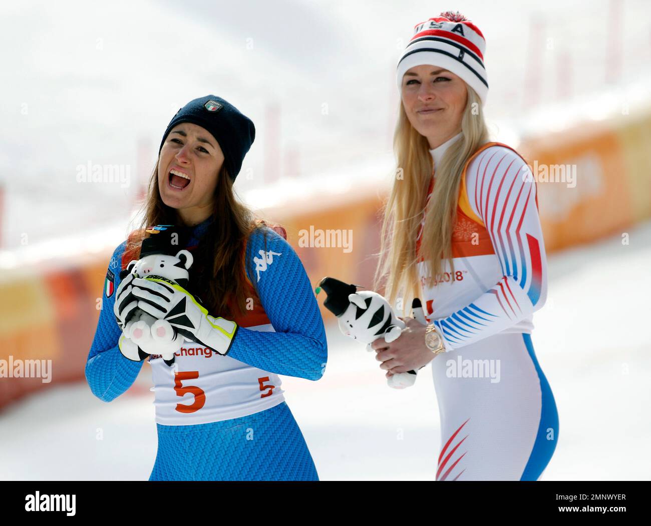 Gold medal winner Sofia Goggia, left, of Italy, and bronze medalist(01)