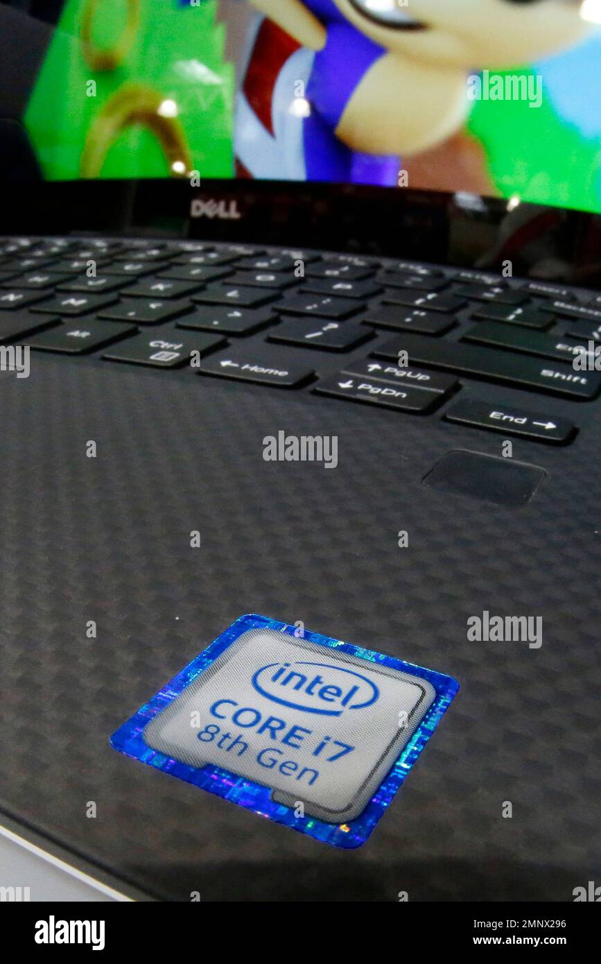 This Jan. 1, 2018, photo shows an Intel sticker on a Dell computer on ...