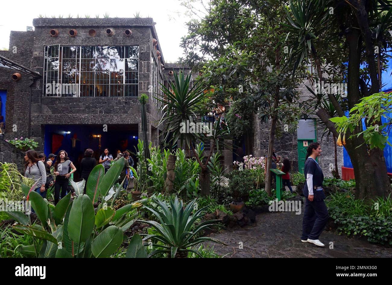 In this July 28, 2016 photo, tourists walk the extensive gardens at La
