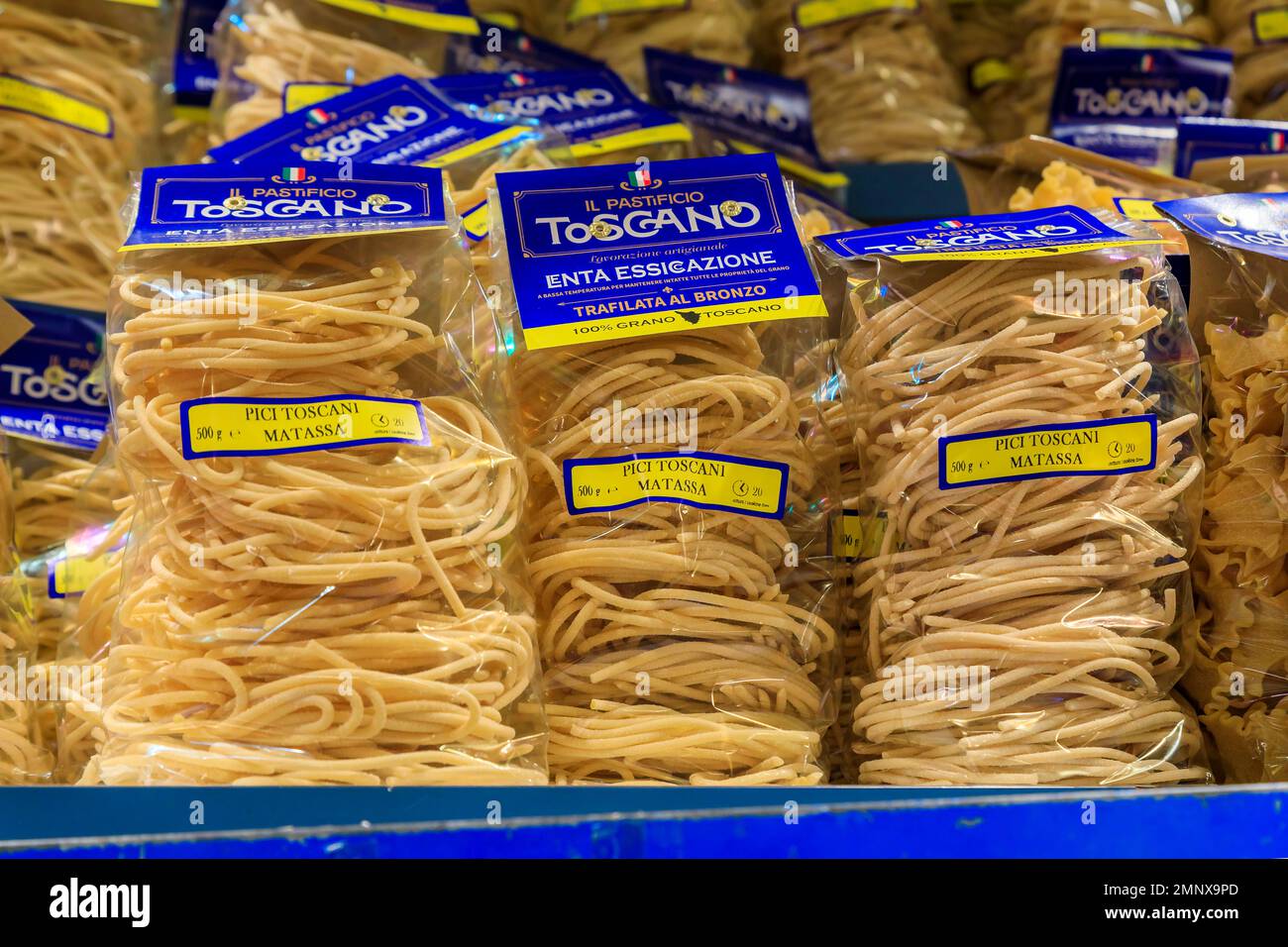 Florence, Italy - June 03, 2022: Dried pici toscani, thick hand rolled Tuscan artisanal pasta on display at a shop in Central Market Mercato Centrale Stock Photo