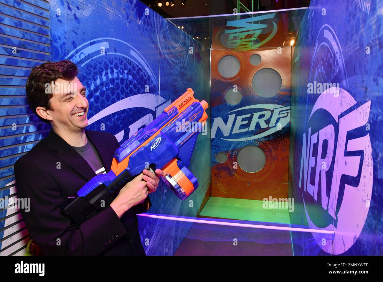 IMAGE DISTRIBUTED FOR HASBRO, INC. - A demonstrator at the Hasbro, Inc. showroom fires the NERF N-STRIKE ELITE INFINUS blaster at American International Toy Fai on Feb. 16, 2018 in