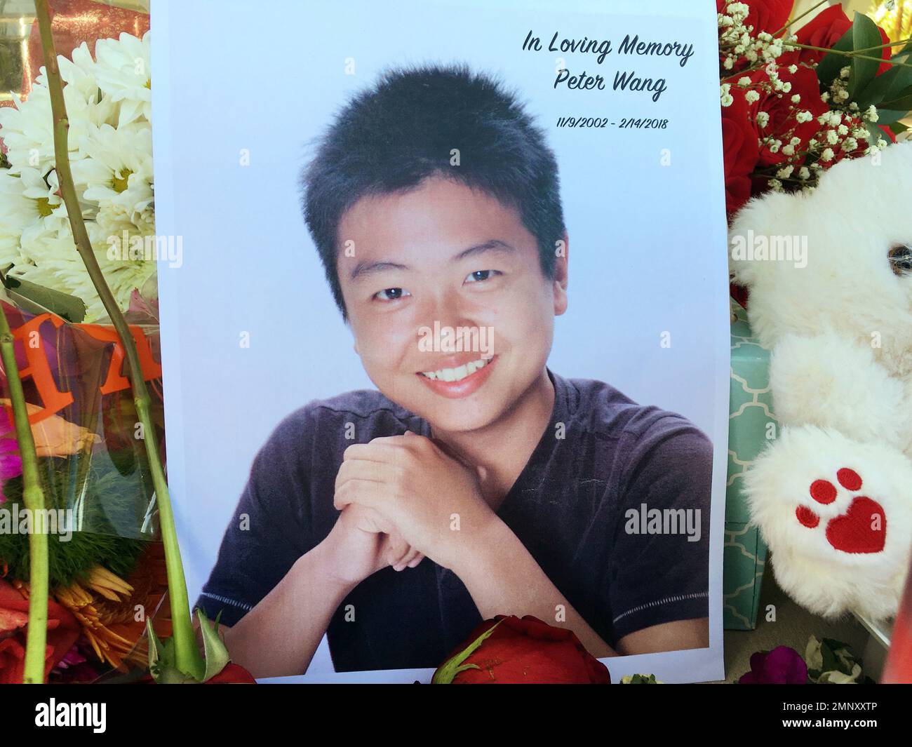 HOLD FOR AARON- Peter Wang is seen in this photo near a memorial in ...