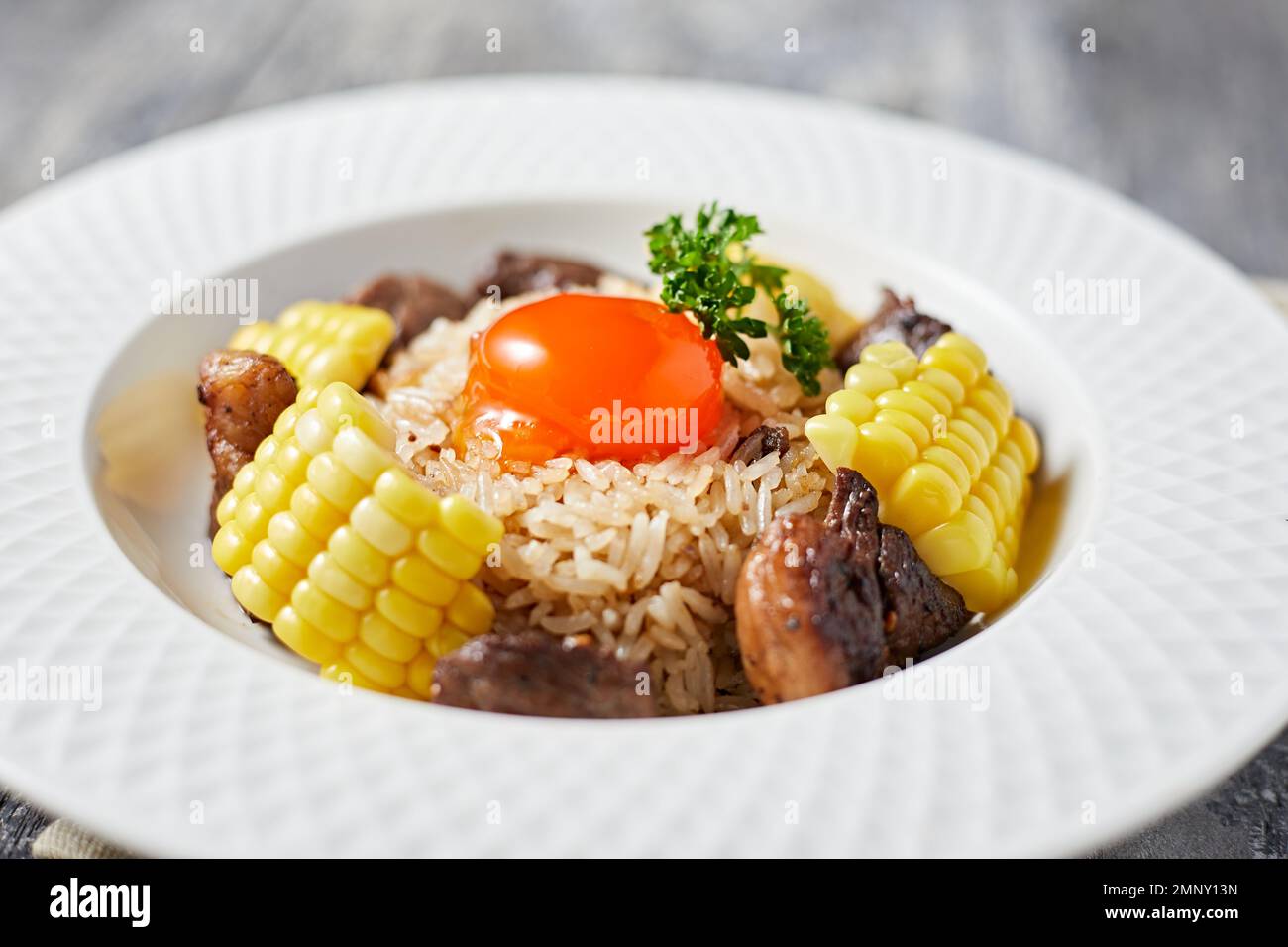 Beef fat fried rice, a dish consisting of a bowl of rice topped with