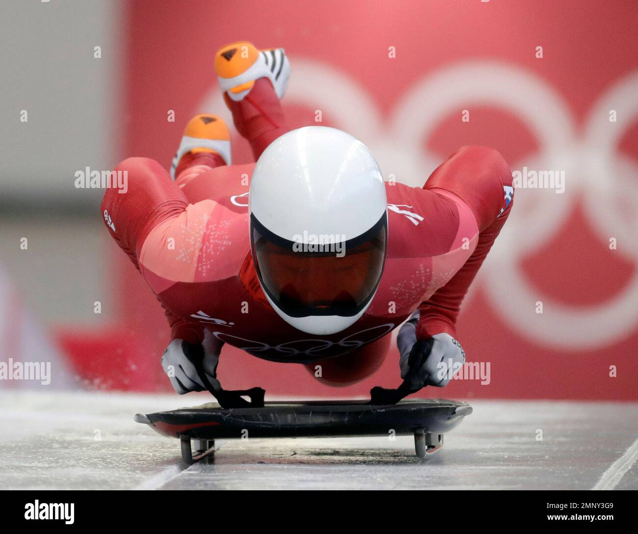 Jisoo Kim of South Korea starts his third run during the men's skeleton ...