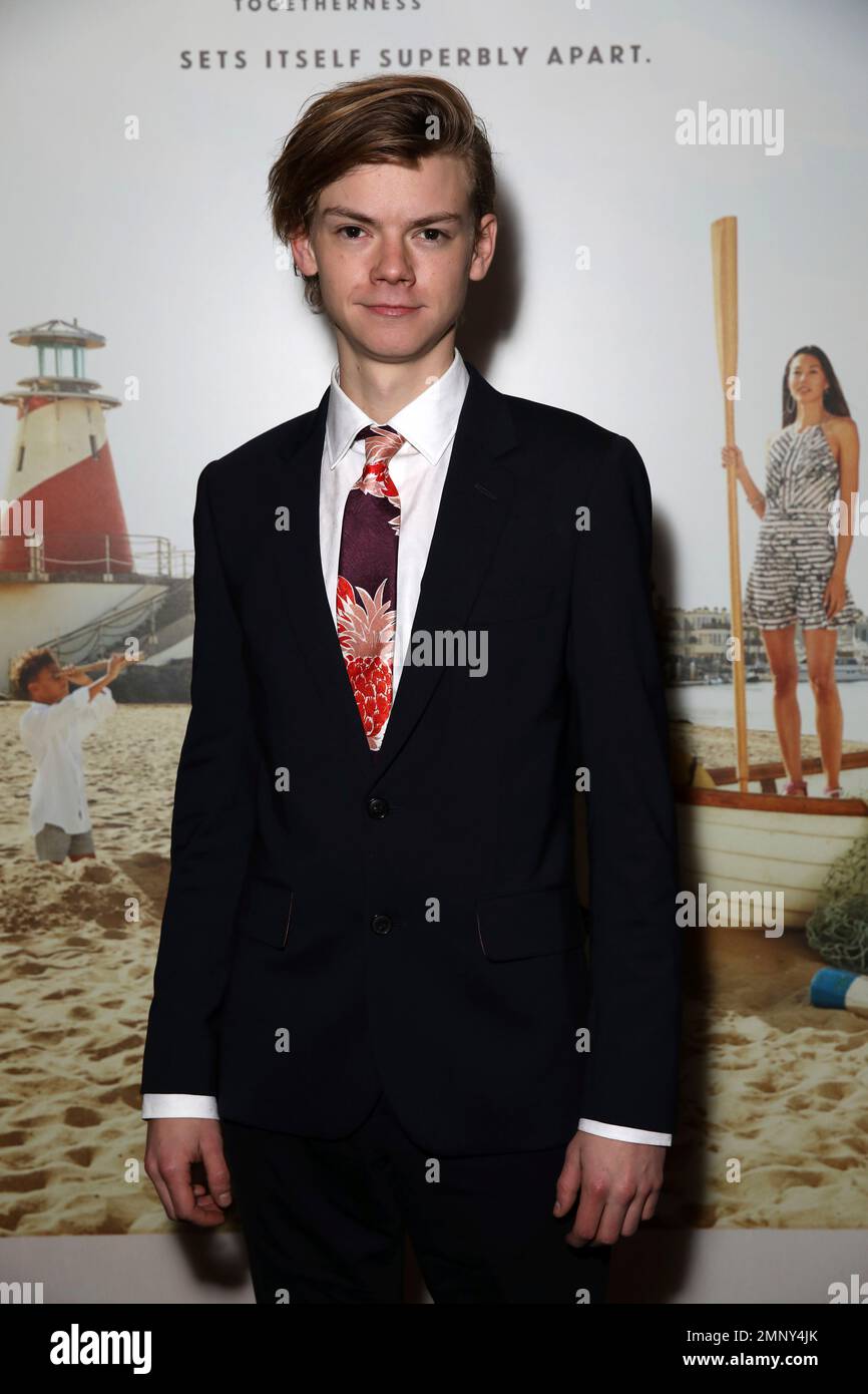 Actor Thomas BrodieSangster poses for photographers on arrival at The