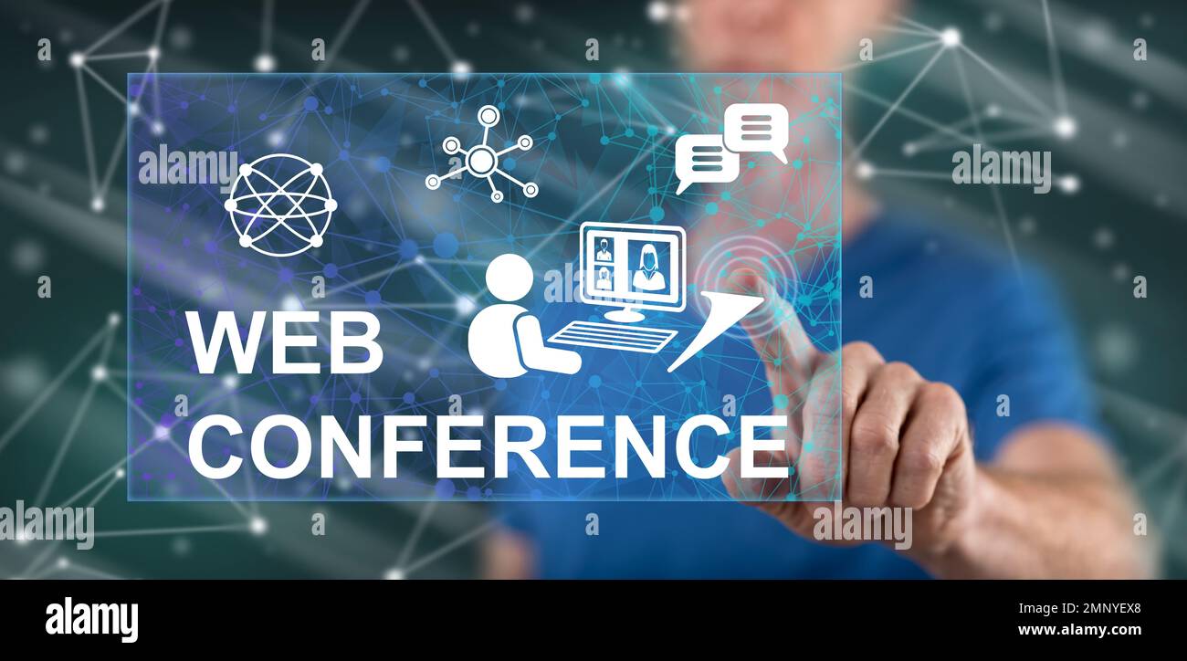 Man touching a web conference concept on a touch screen with his finger Stock Photo