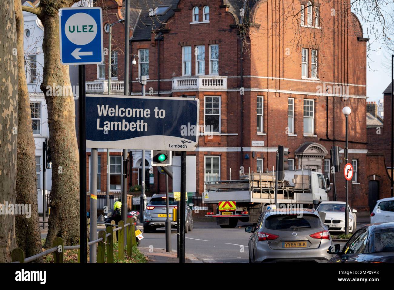 As eleven of the nineteen outer London councils are considering legal action, Transport for London's (TFL) signposts for the new Ultra Low Emission Zone (ULEZ) are seen on the A205 South Circular at Clapham Common in South London, but are due to be expanded beyond the inner orbital road perimeter around the capital, on 30th January 2023, in London, England. Now 18 times larger, the new ULEZ area bans older vehicles such as polluting diesels and petrol cars older than 2006, an attempt to lower poisonous emissions that further harm the health of 1 in 10 children who have asthma. Drivers of non-e Stock Photo