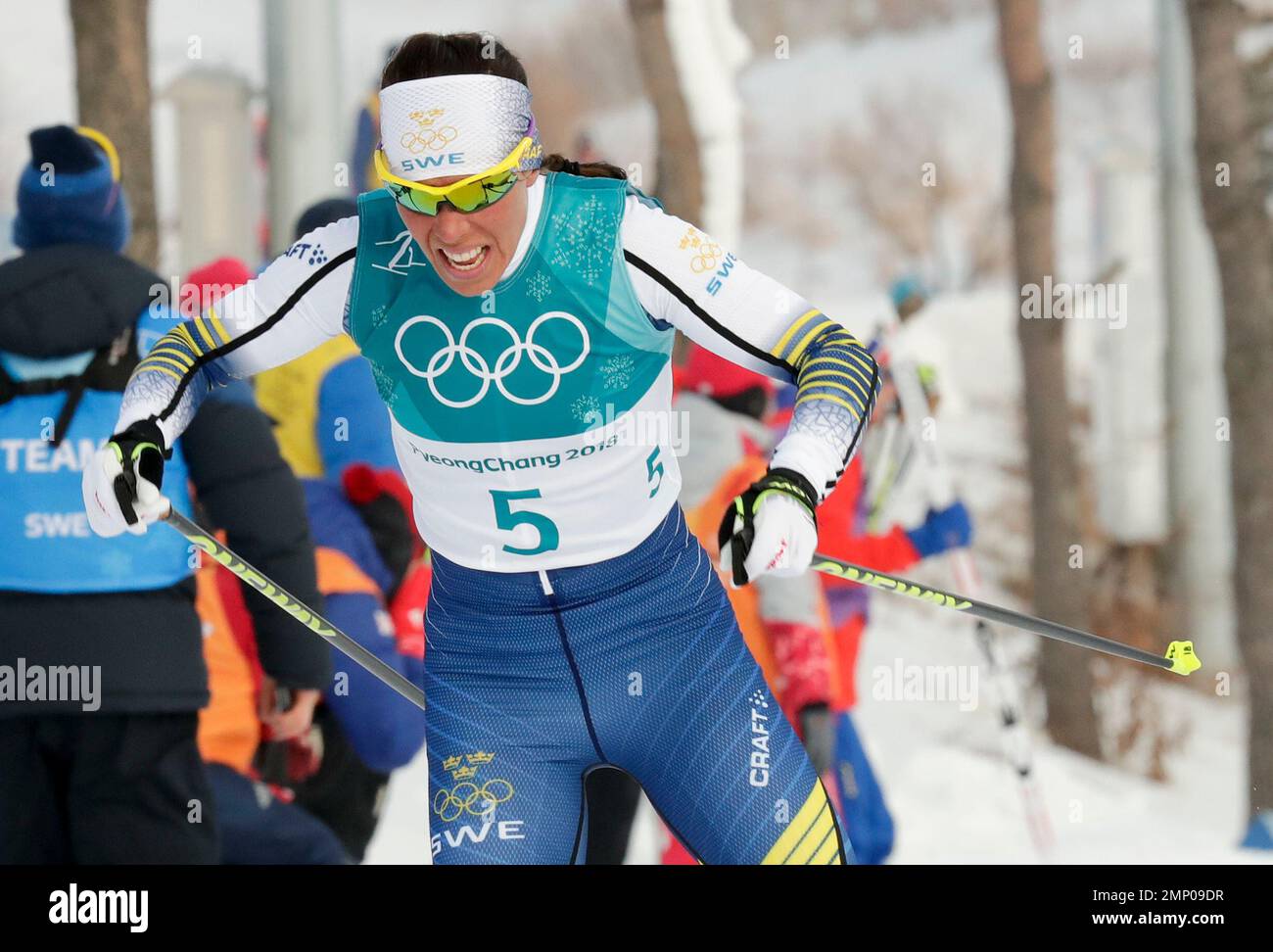 Charlotte Kalla, of Sweden, competes during the women's 7.5km /7.5km ...