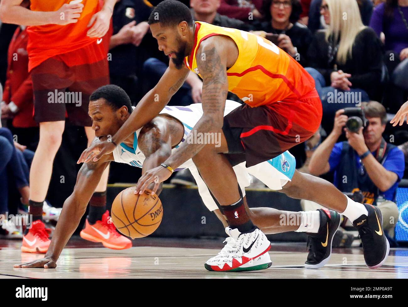 Utah Jazz Forward Royce O'Neale Exits Game With Ankle Injury, Sidelining Him Indefinitely Charlotte Hornets guard Treveon Graham, rear, and Utah Jazz forward
