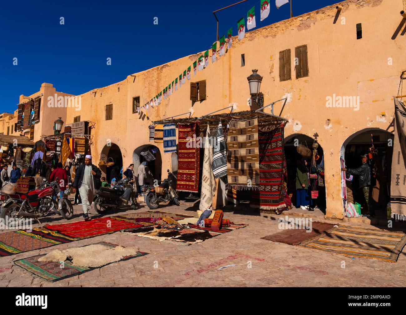 Carpet sellers at market square, North Africa, Ghardaia, Algeria Stock Photo