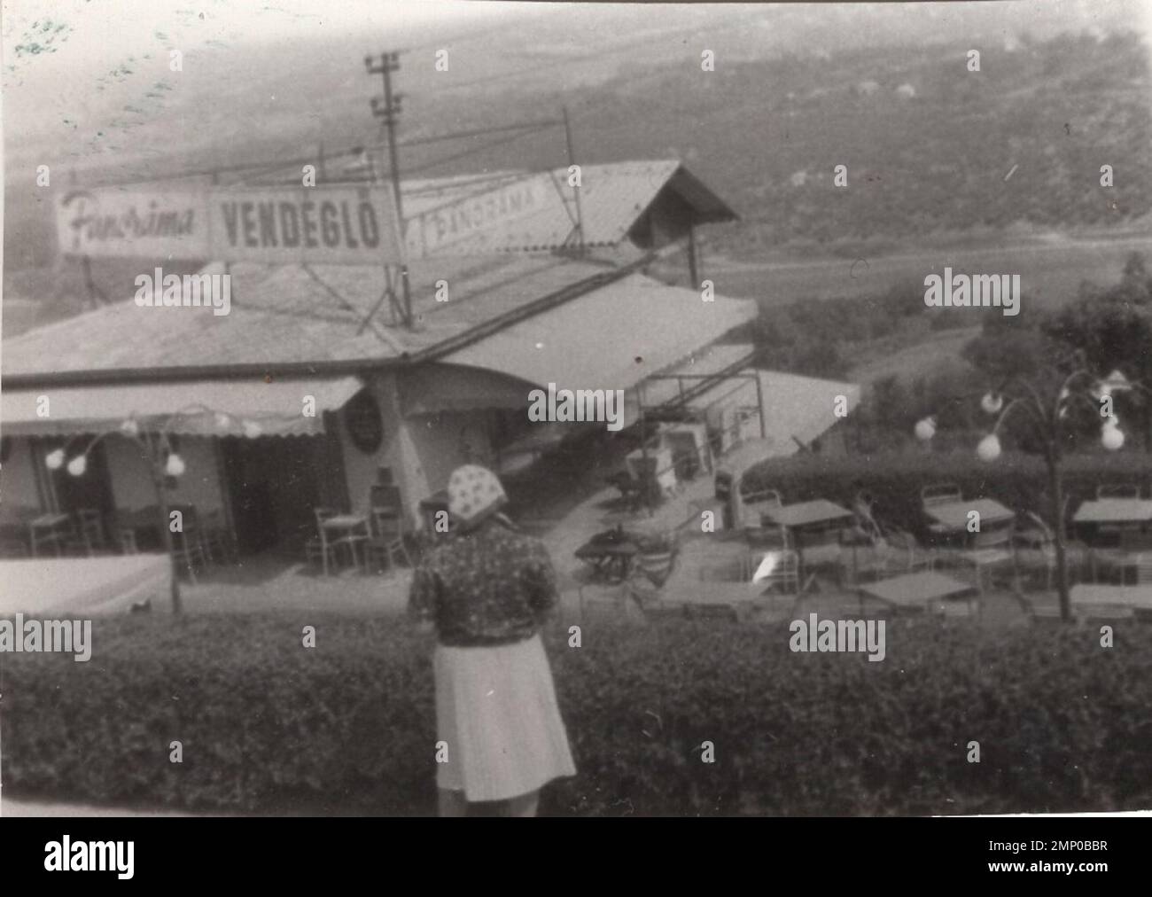 vintage moment / vintage funny moment / vintage photograph / power of the moment / magic moments / Panoráma vendéglő / hungary / 1930s / restaurant / vintage restaurant / lady / terrace tables / restaurant on the high / beautiful view / Stock Photo