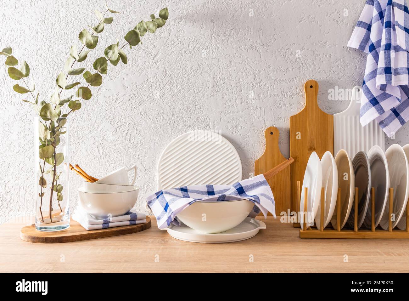 modern kitchen interior with various kitchen utensils on a wooden ...