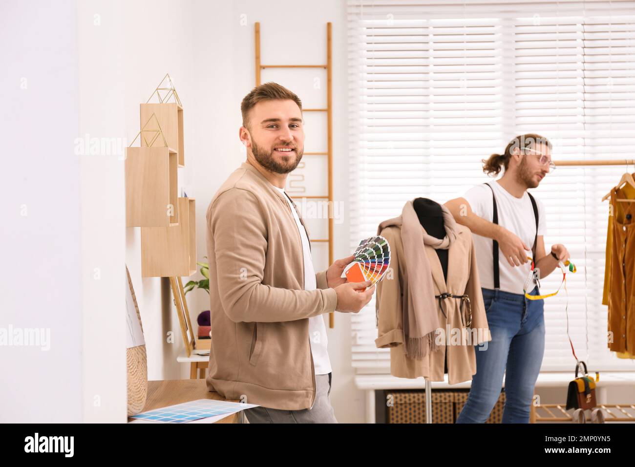 Creative fashion designer colleague hi-res stock photography and images ...