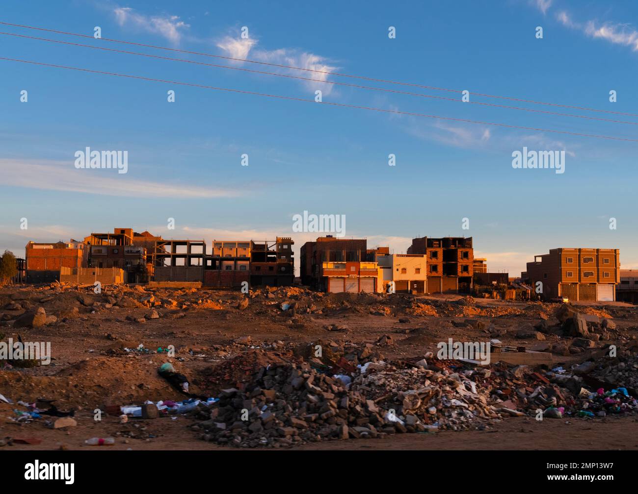 Garbages in front of new houses, North Africa, Tamanrasset, Algeria Stock Photo