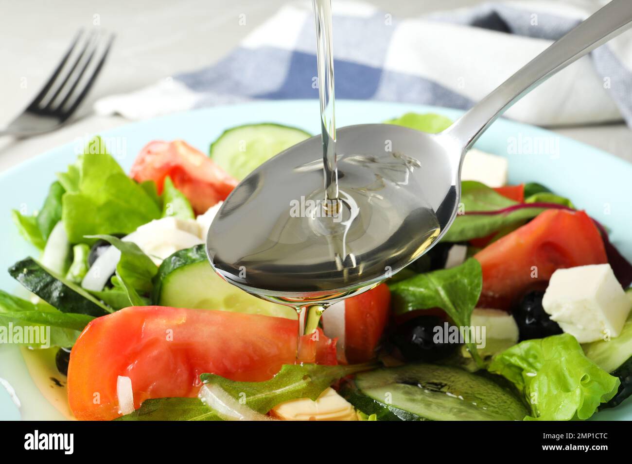 Adding Fresh Oil Adding arugula fresh vegetable salad hi-res stock photography and ...