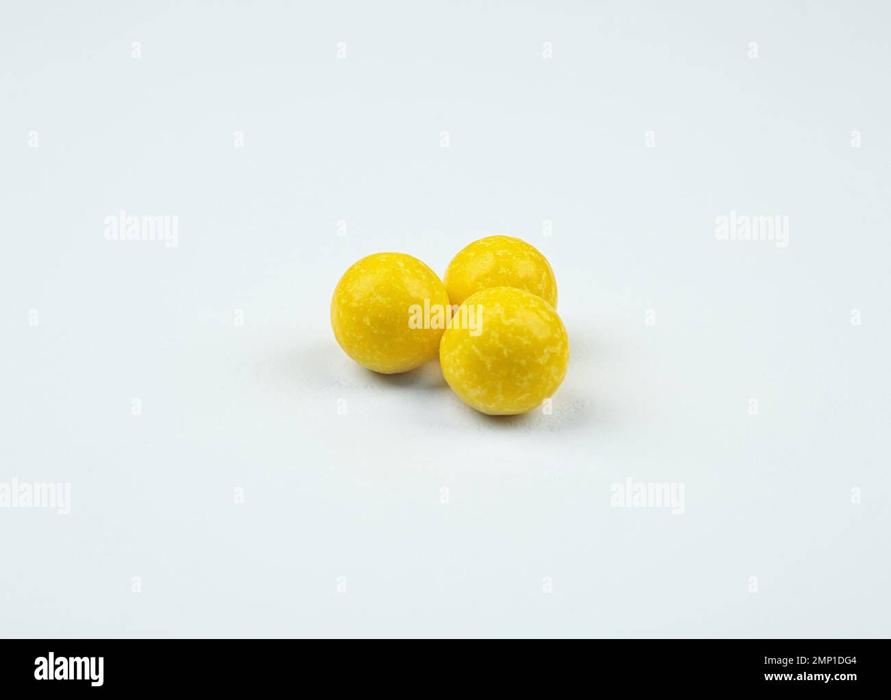 Delicious lemon chewing gums on white background Stock Photo Alamy