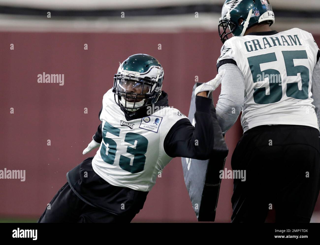 Philadelphia Eagles outside linebacker Nigel Bradham (53) and defensive end  Brandon Graham (55) go through drills during a practice for the NFL Super  Bowl 52 football game Thursday, Feb. 1, 2018, in