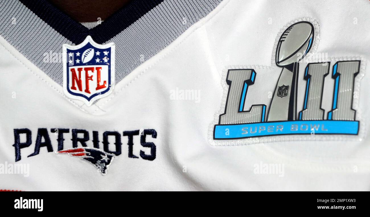 The Super Bowl 52 logo is worn on the jersey of New England Patriots free  safety Devin McCourty as McCourty answers questions during a news  conference Wednesday, Jan. 31, 2018, in Minneapolis.