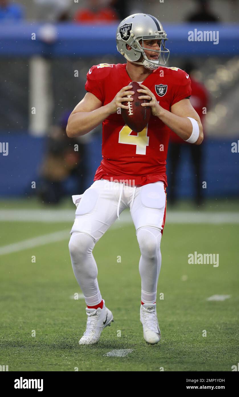 Oakland Raiders quarterback Derek Carr (4) looks to throw a pass during
