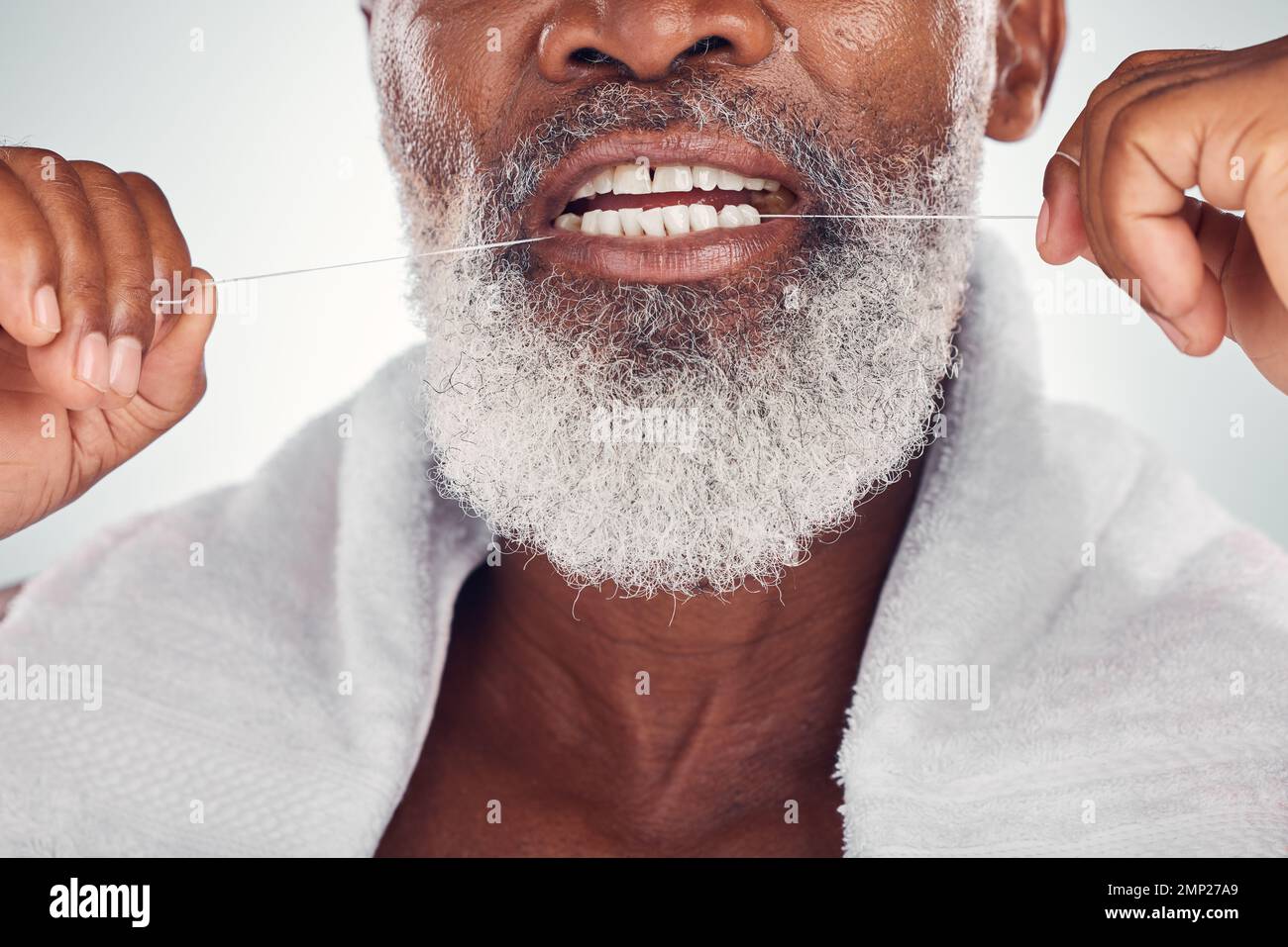 Floss, dental and teeth of senior man isolated on white background for