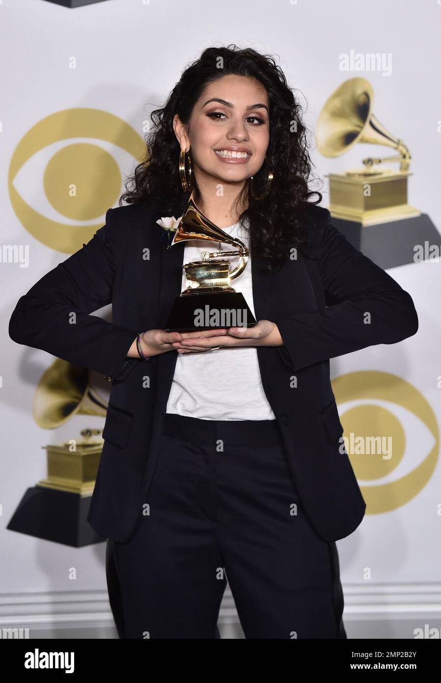 Alessia Cara poses in the press room with the best new artist award at