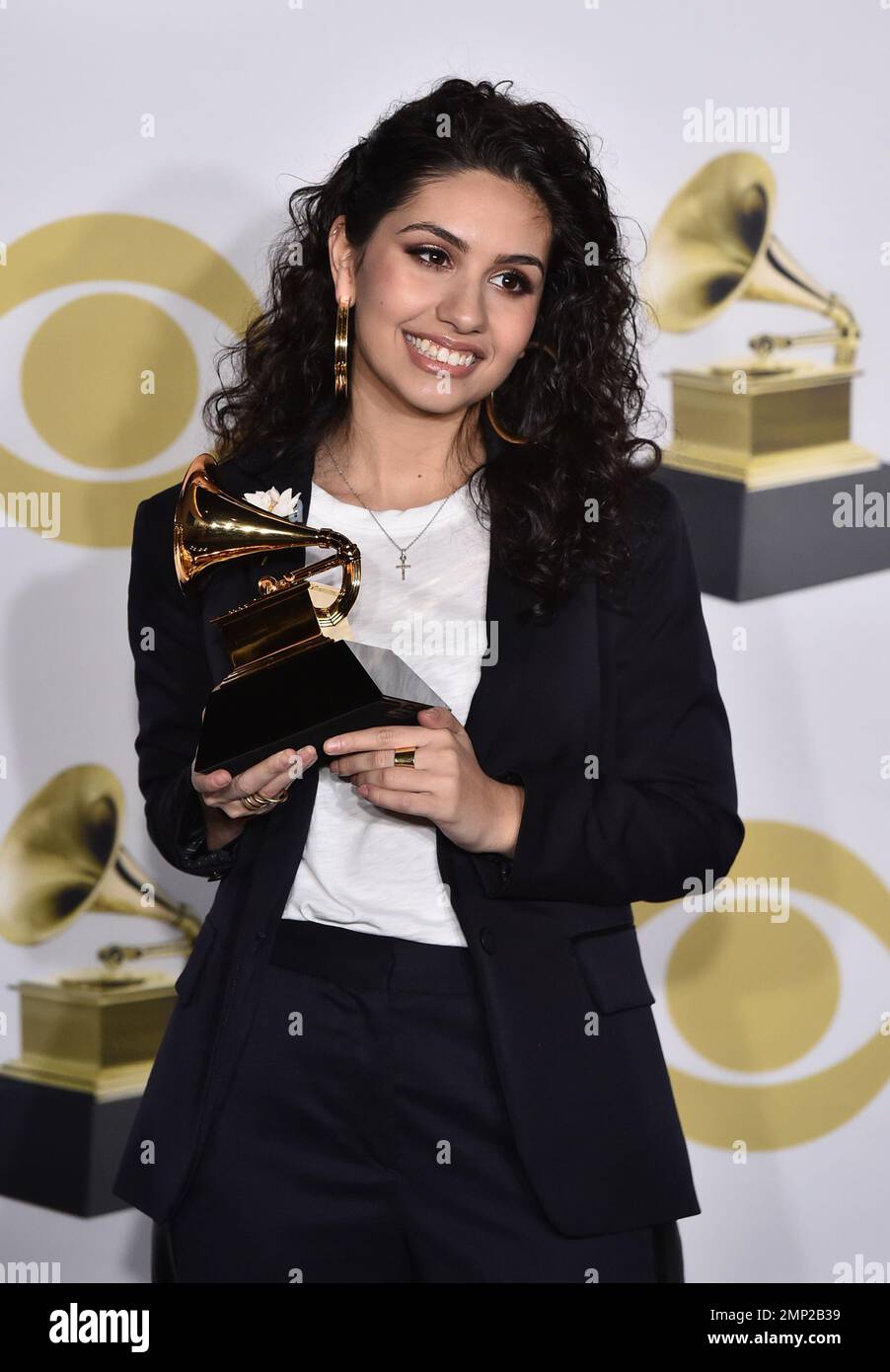 Alessia Cara poses in the press room with the best new artist award at