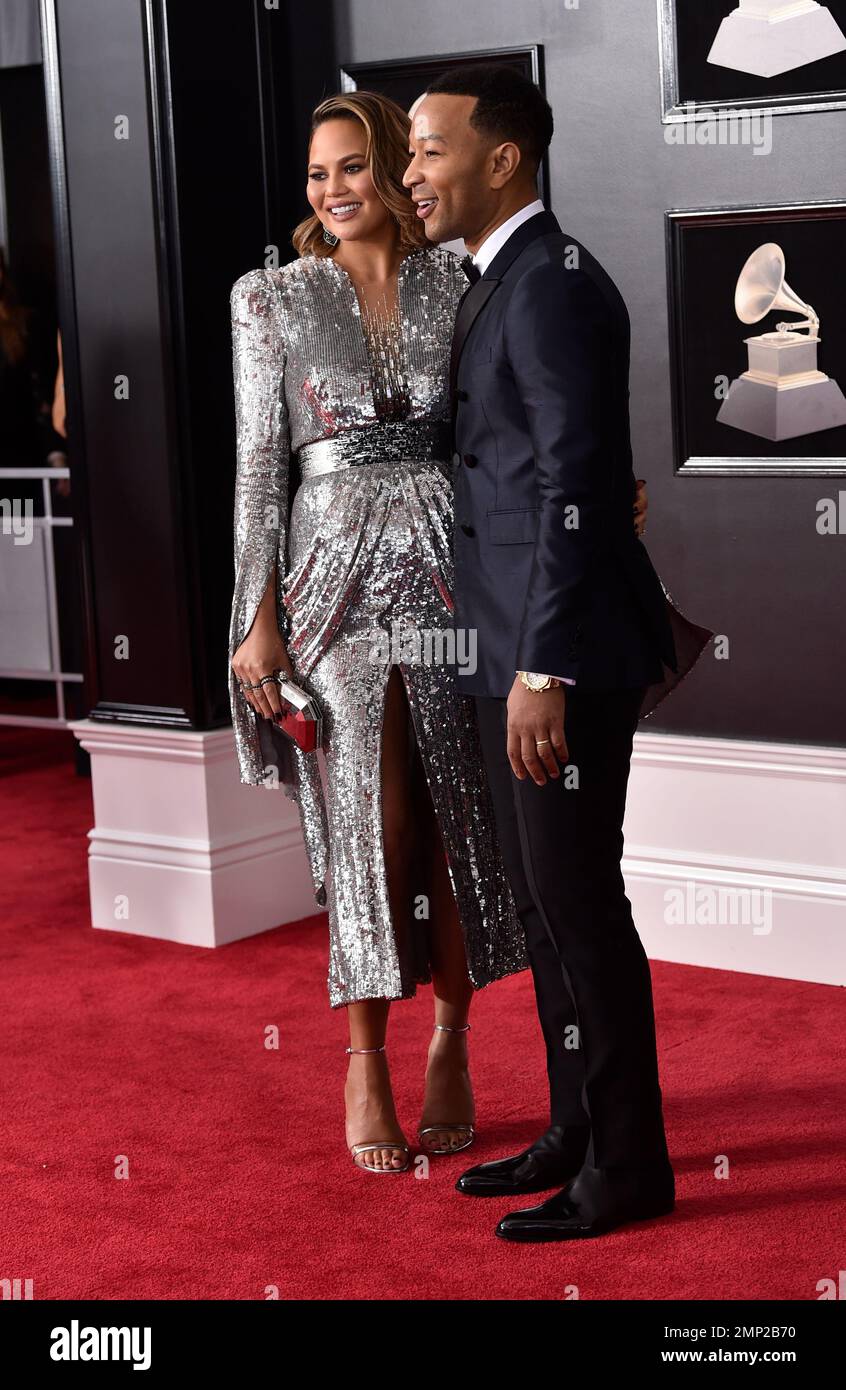 Chrissy Teigen and John Legend arrive at the 60th annual Grammy Awards