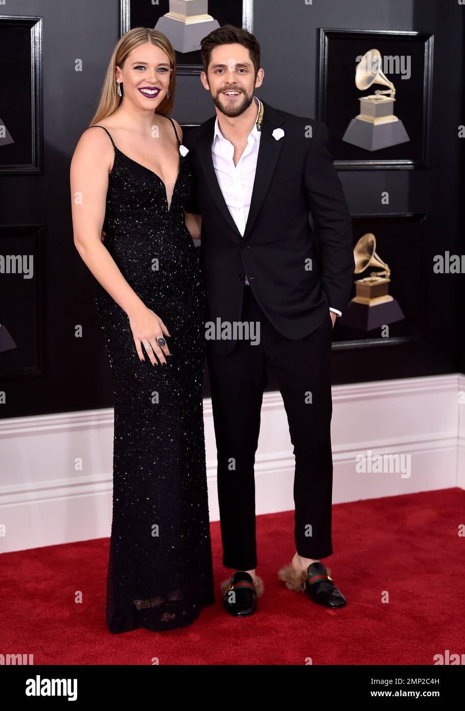 Thomas Rhett, right, and Lauren Akins arrive at the 60th annual Grammy