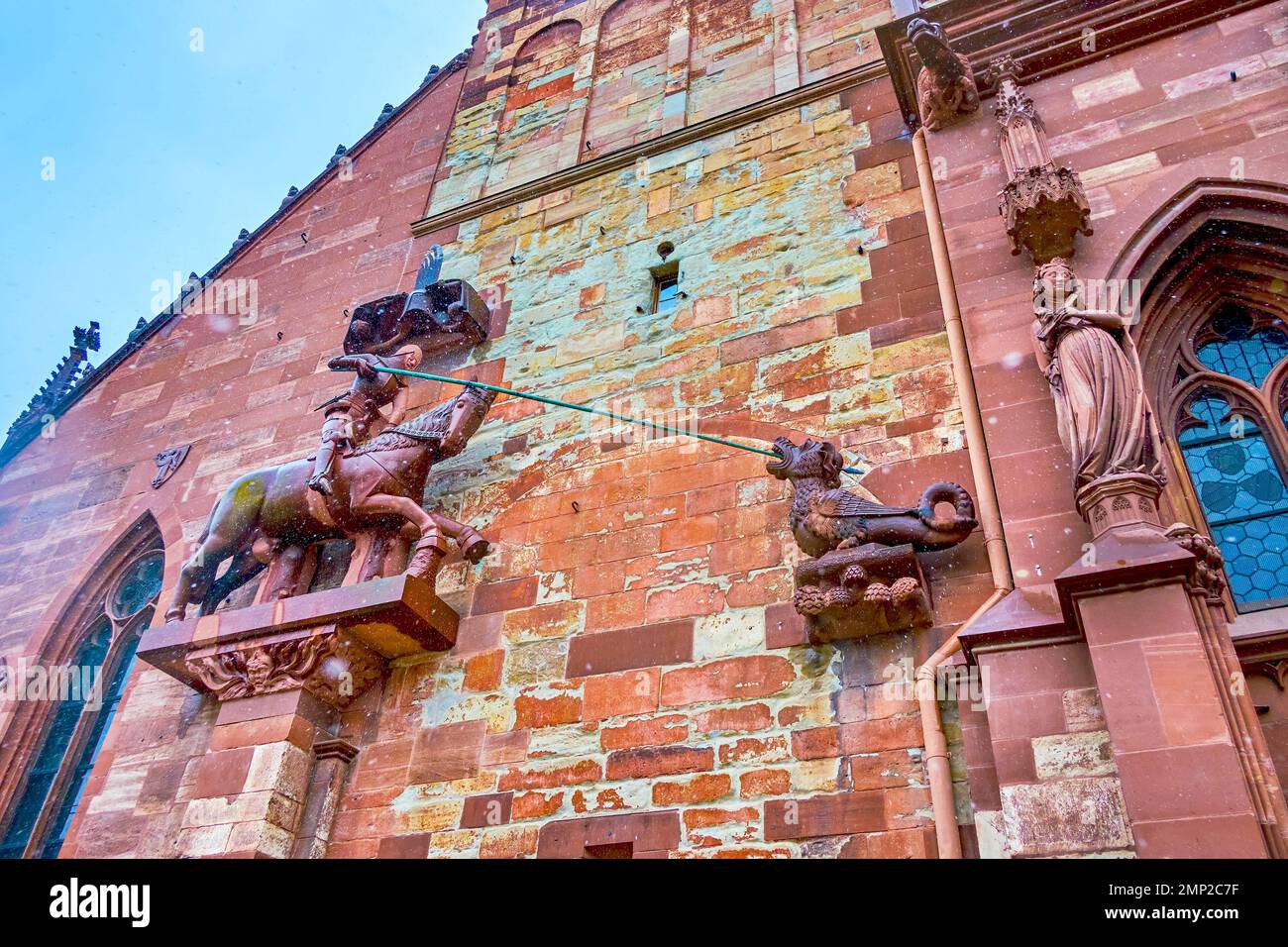 The stone sculpture of St. George Dragon Slayer and Martyr on facade of ...
