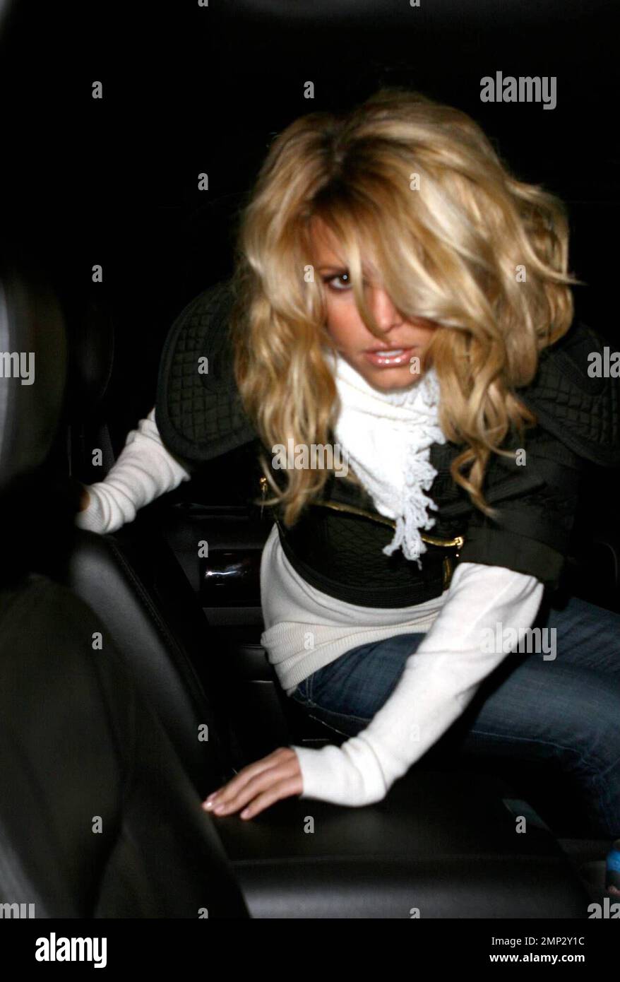 Jessica Simpson visits NYC and seems to have some difficulty getting out of  her limo outside her Manhattan hotel. Once out of the car, a bodyguard  assists in getting her and her
