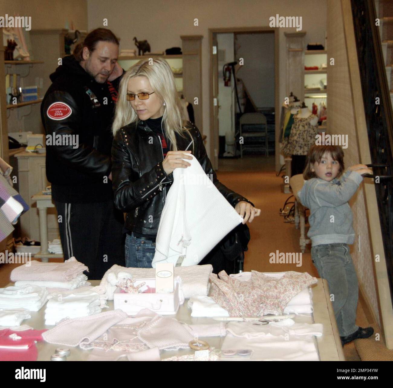 Russell Crowe shows he is a hands-on dad during a shopping spree in LA ...