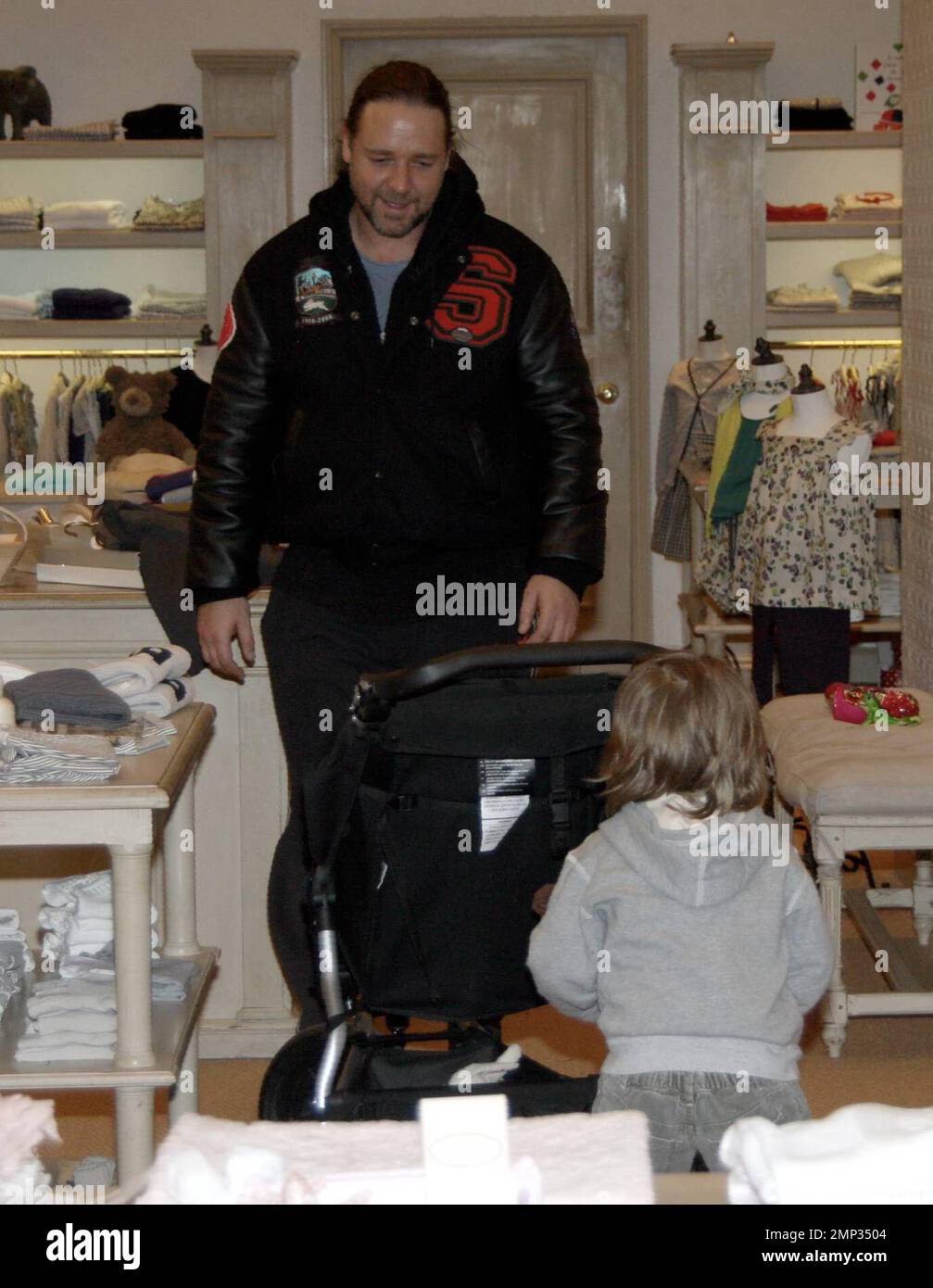 Russell Crowe shows he is a hands-on dad during a shopping spree in LA ...