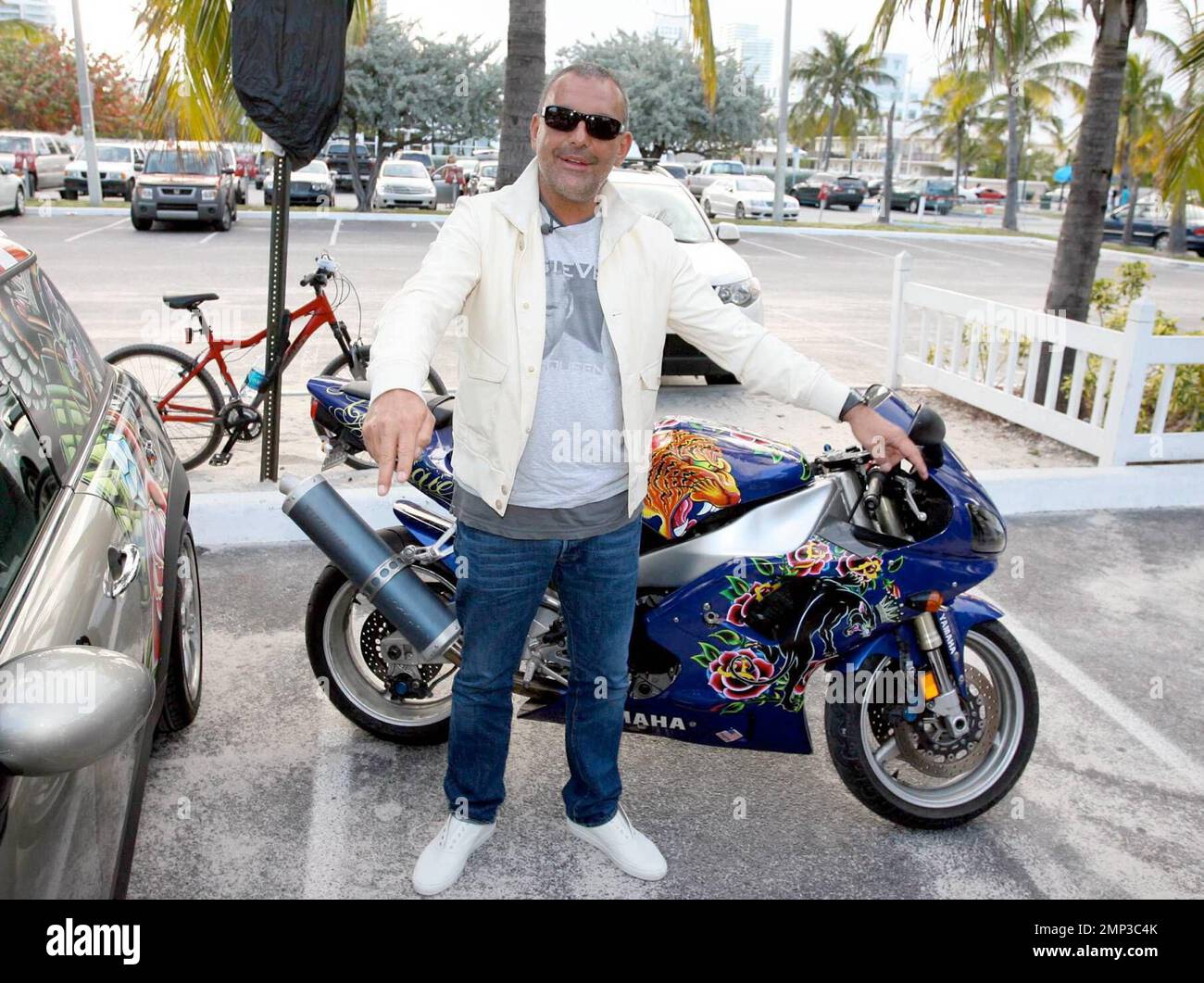 Fashion guru Christian Audigier promotes his wine brand at Nikki Beach Club, Miami Beach, FL, 4/12/08. Stock Photo