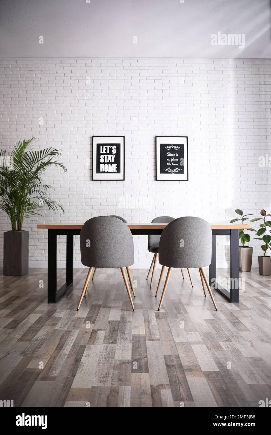Modern dining room interior with stylish furniture Stock Photo - Alamy