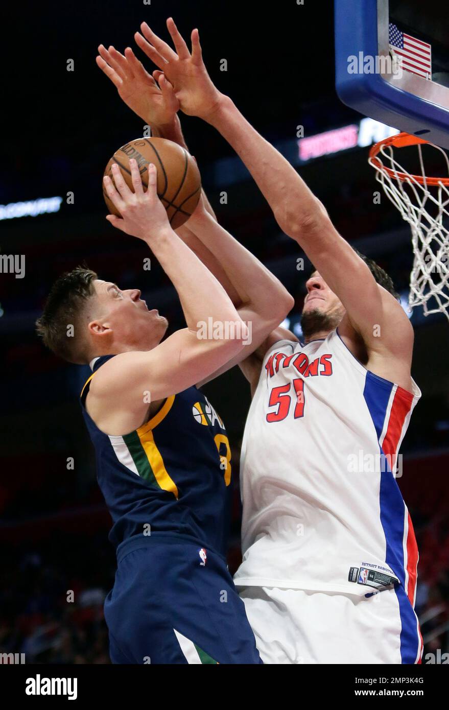 Utah Jazz forward Jonas Jerebko, left, goes to the basket against