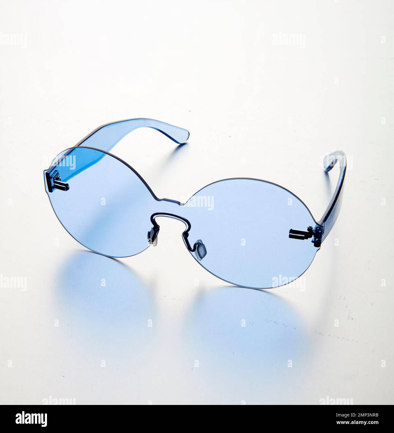 tinted,sunglasses,shades,hip,groovy,seventies,fashion,eyewear,accessory,plastic,trendy,design,70s,hippy,cut-out,white,background,designer,festival, Stock Photo