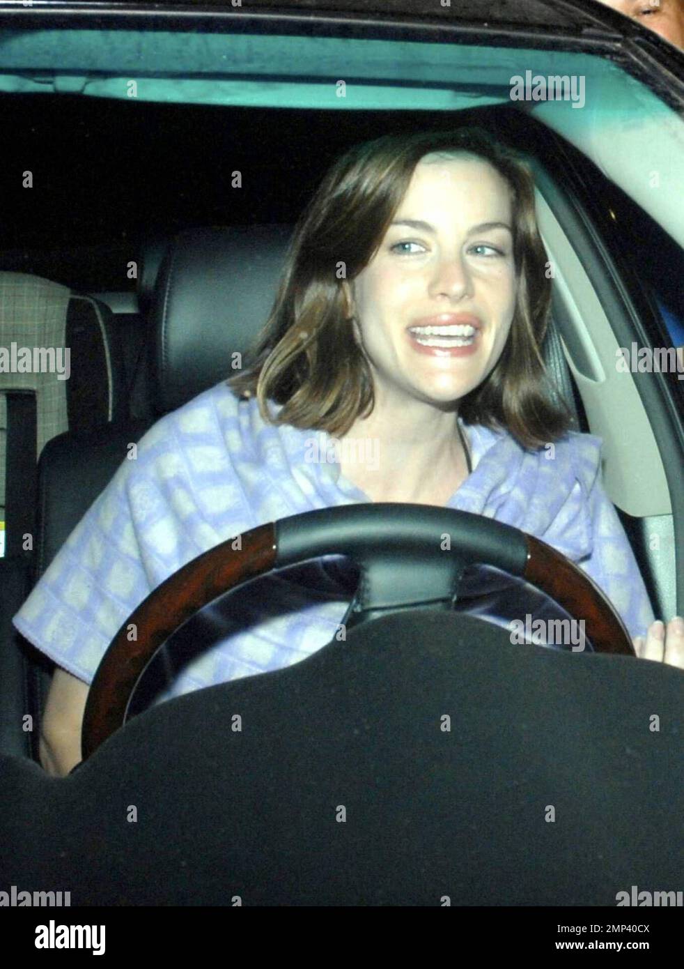 Liv Tyler leaves Mr Chow and has a hard time seeing with all the