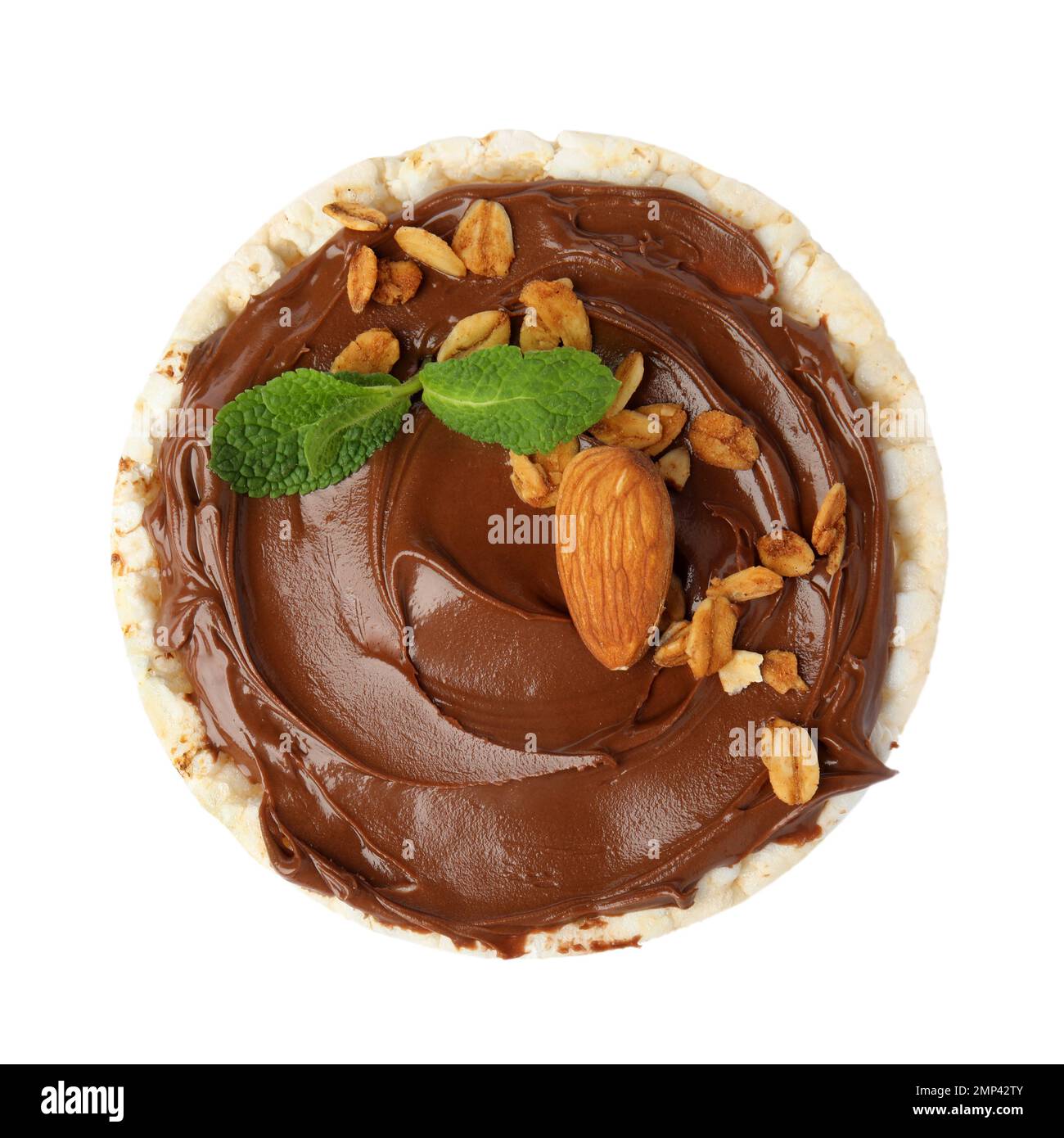 Puffed rice cake with chocolate spread, nuts and mint isolated on white