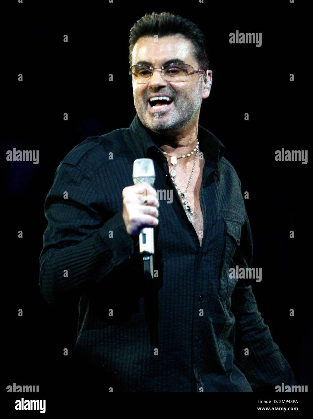 George Michael celebrates his 45th birthday by performing at the Forum ...