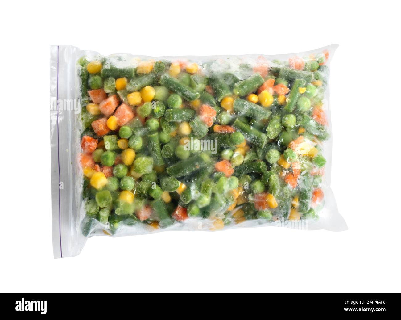 Frozen vegetables in plastic bag isolated on white, top view Stock Photo