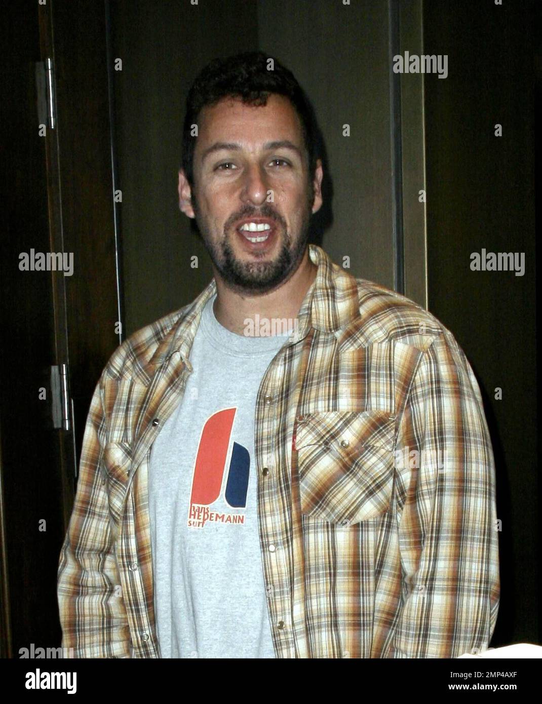 Exclusive!! Funny man actor Adam Sandler poses for photos outside