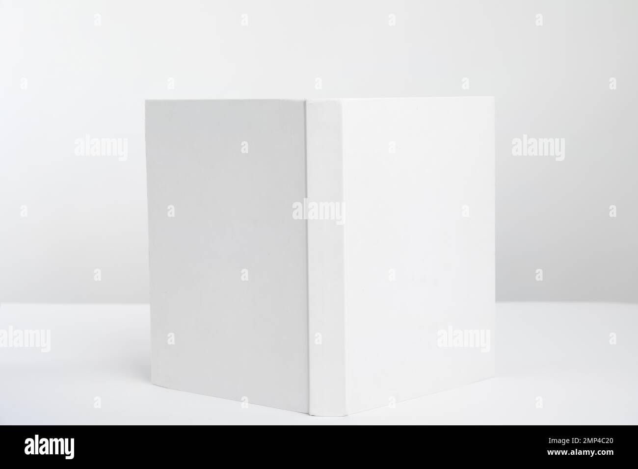 Book with blank cover on white background stock photo alamy