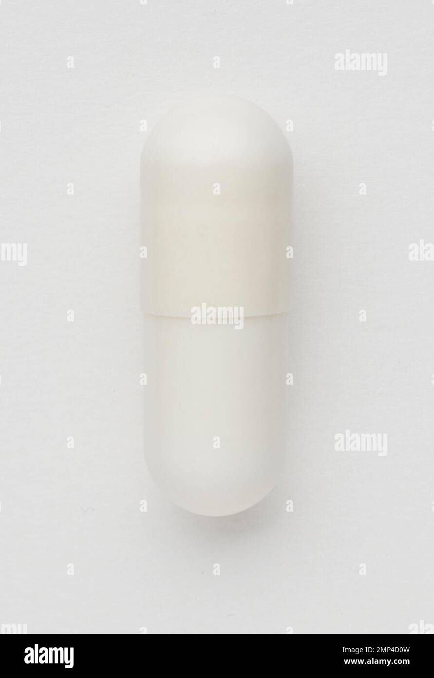 pill white capsule medication nutrition chemical health doctor prescribe wellbeing clinic hospital Harley Street cut-out high resolution medicine Stock Photo
